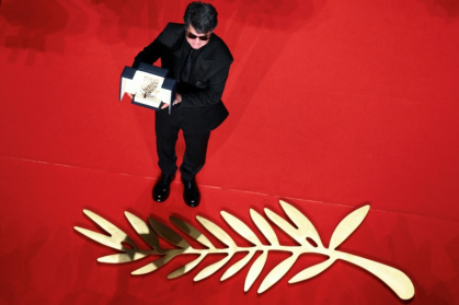 Le réalisateur et scénariste iranien Jafar Panahi, Palme d'Or du Festival de Cannes pour son film "Un simple accident", le 24 mai 2025 - Antonin THUILLIER (AFP) Le réalisateur et scénariste iranien Jafar Panahi, Palme d'Or du Festival de Cannes pour son film "Un simple accident", le 24 mai 2025 - Antonin THUILLIER (AFP)